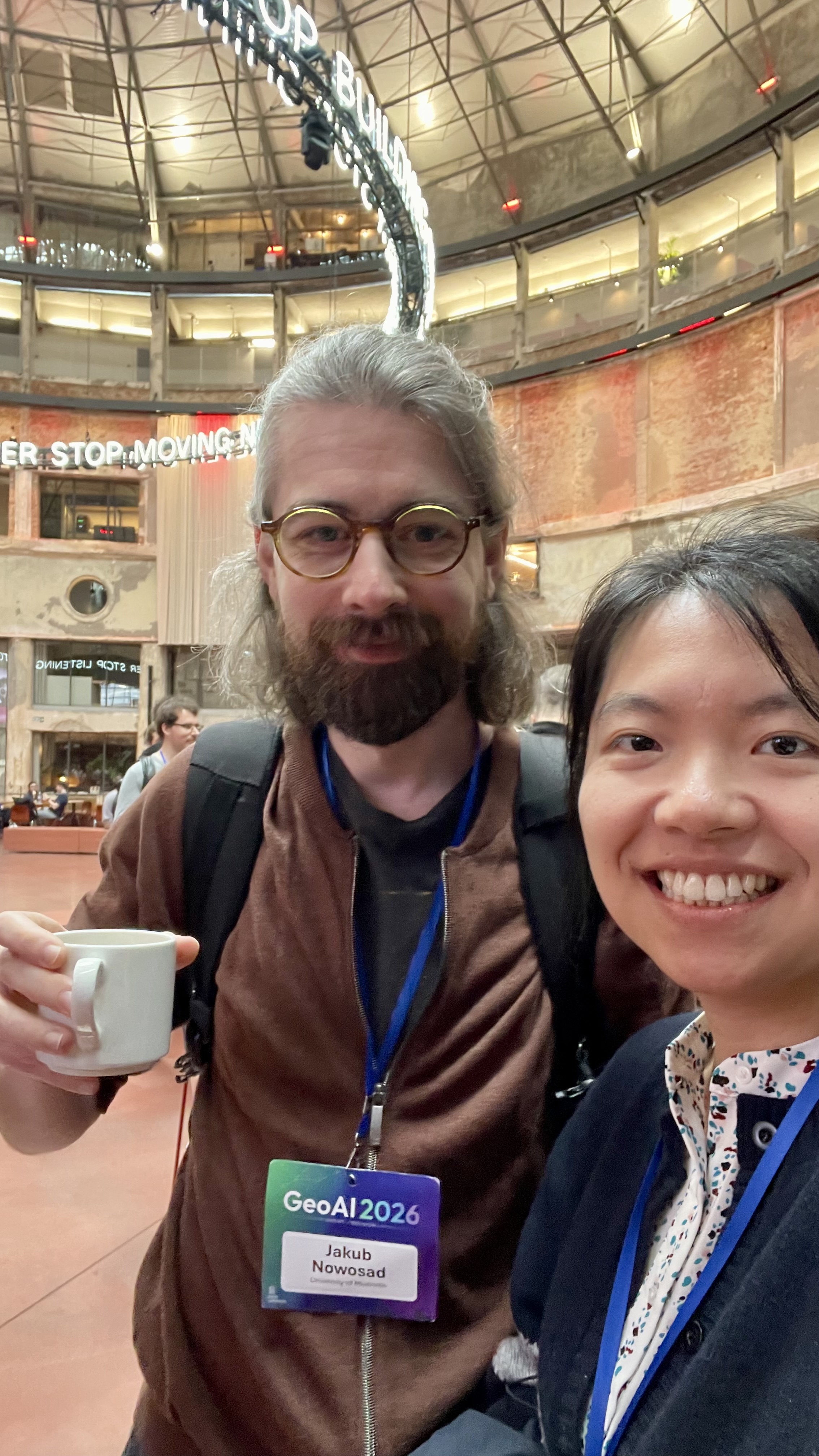 A selfie with a colleague during a coffee break at GeoAI 2026
