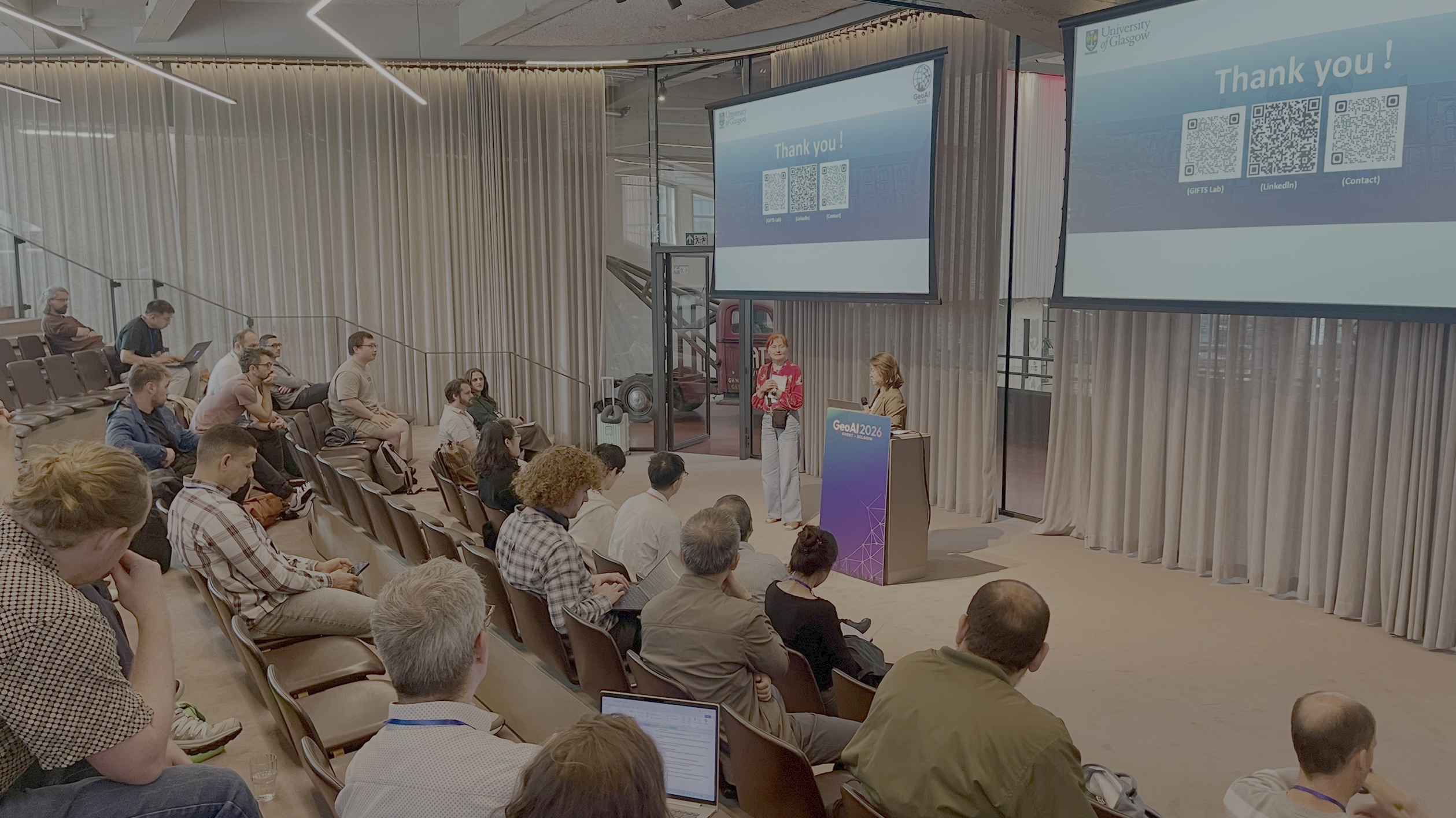 A discussion with the audience during a GeoAI conference session