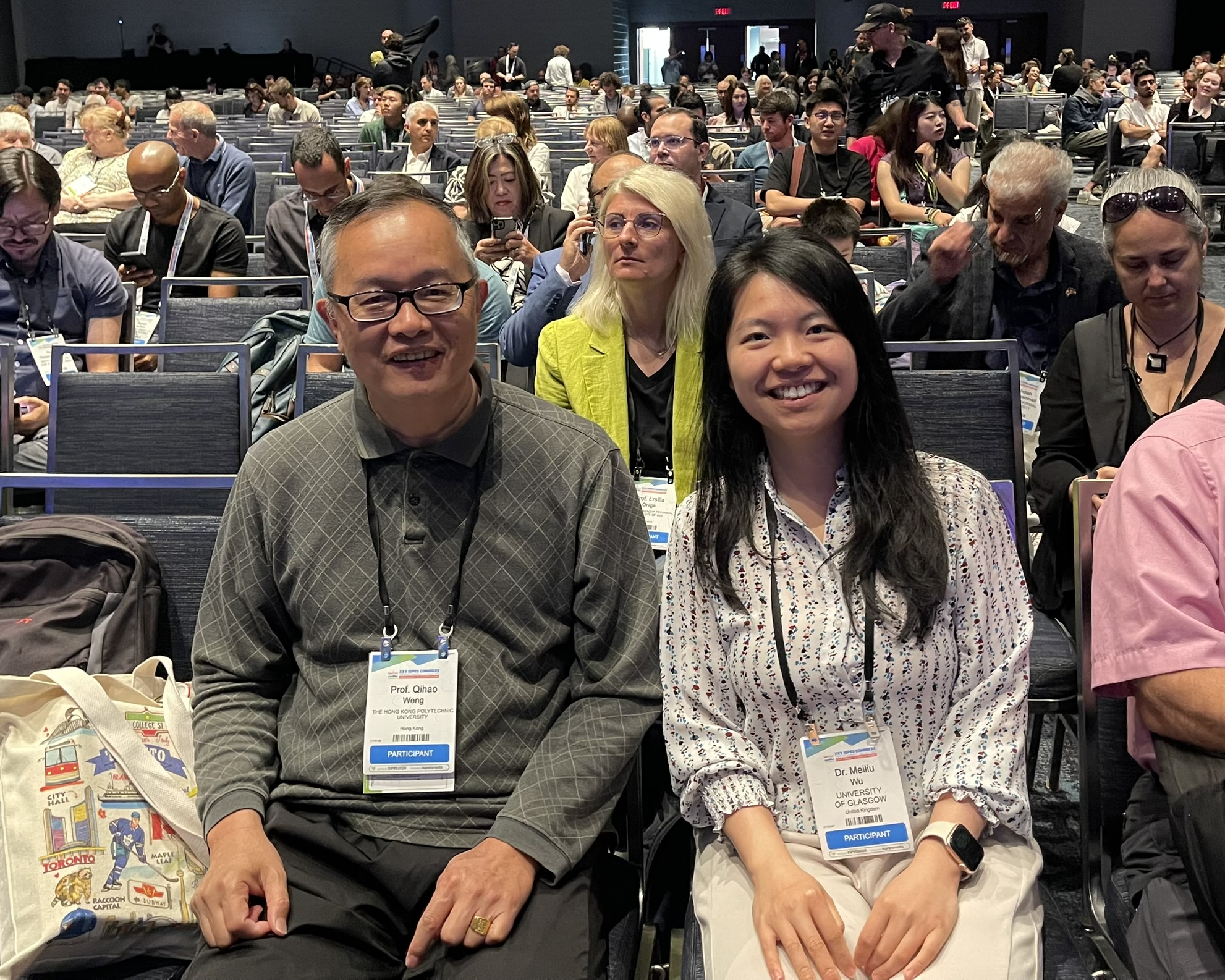 Colleagues together in the ISPRS Congress auditorium