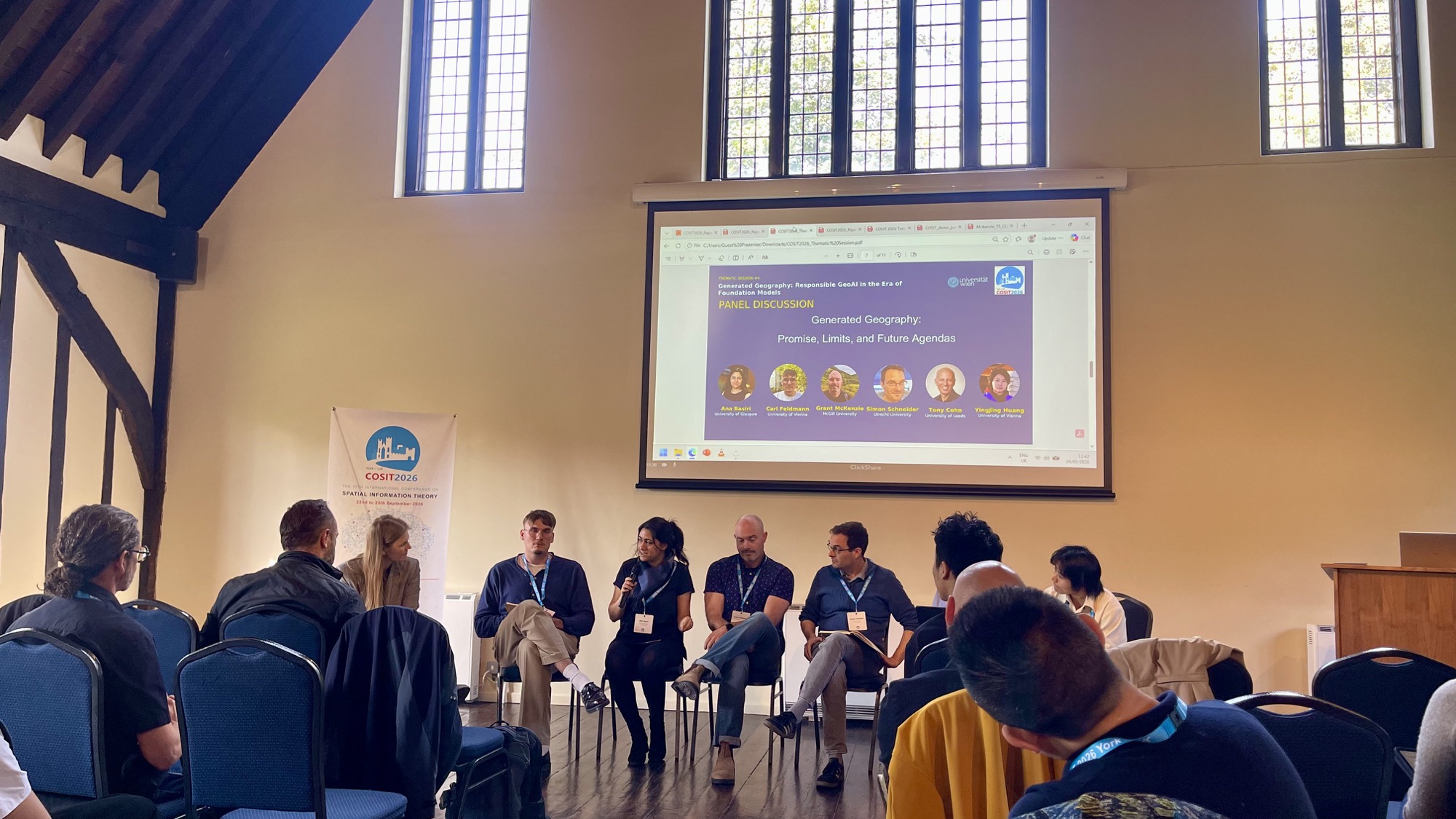 A panel discussion during a COSIT 2026 thematic session